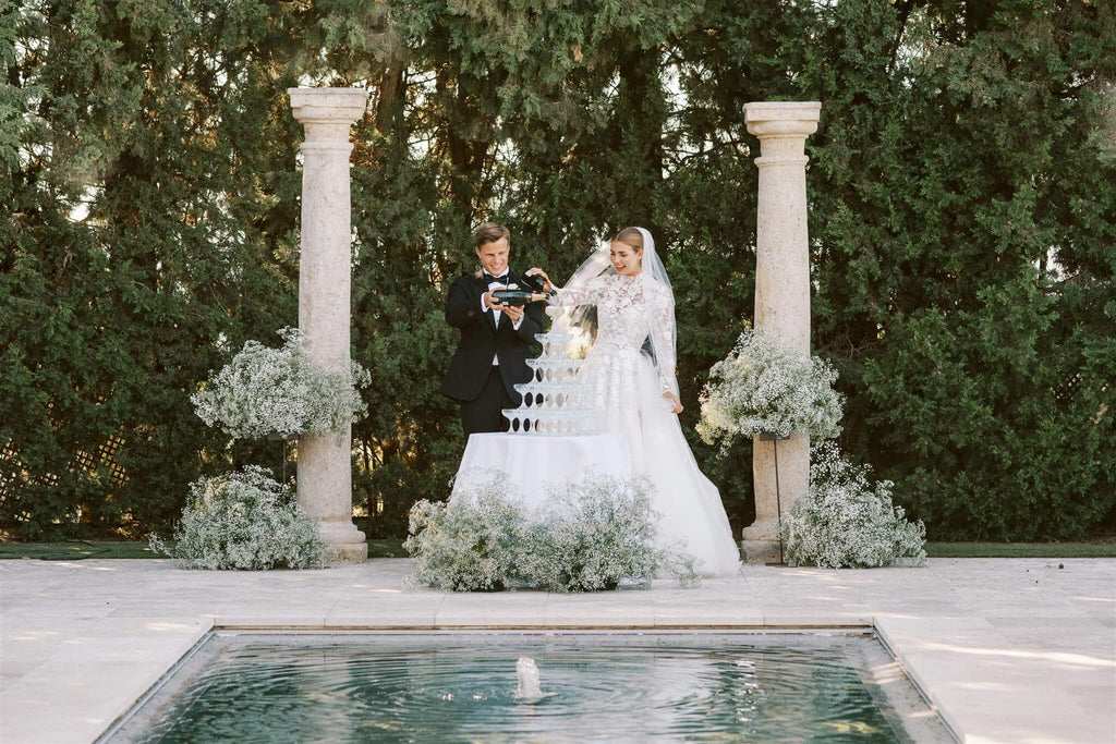 Event Planner: Amanda Costa Thompson. bride and groom champagne tower